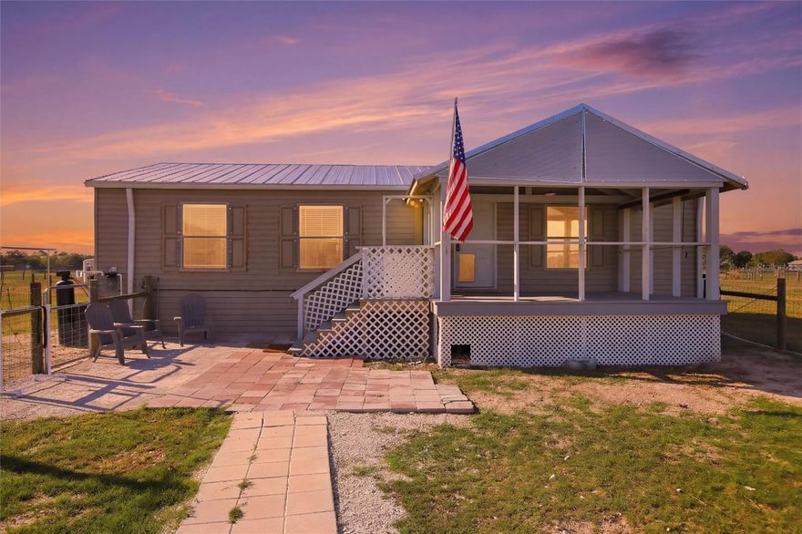 This featured property is nestled on a peaceful 5-acre lot, this home offers 3 bedrooms and 2 bathrooms.  The interior features an open kitchen and living area fully equipped with essential appliances, including a stove, oven, microwave, washing machine, and dryer. The home is move-in ready and protected by a durable metal roof and hurricane shutters.  The exterior of the property includes several high-value features: A long gravel driveway leading to an additional outdoor storage area,  a 5 filter osmosis system install below kitchen sink, A dedicated shed with a large roll-up garage door, Two covered car or utility ports and A new well and septic tank.

This 5-acre dry land property offers both privacy and an agricultural exemption, making it an excellent opportunity for a variety of needs.  Bring your RVS, boats, animals and toys.  This property is everything you need to start your new off grid living.