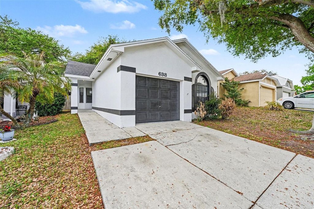 Photo of 638 Lake Dexter Circle, Winter Haven, FL 33884 (MLS # O6390069)