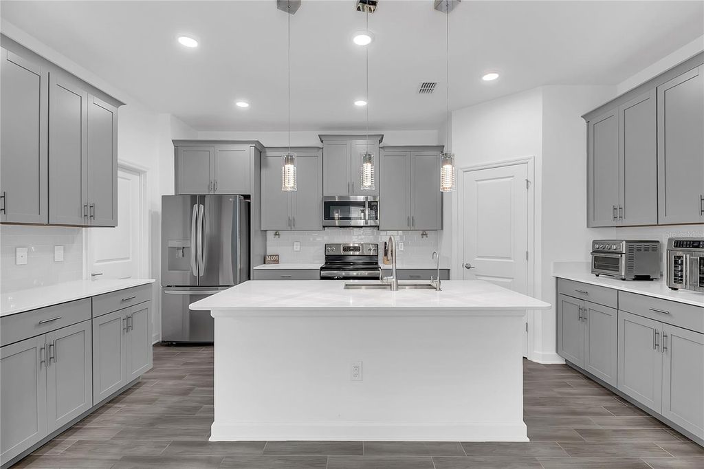 Photo of 1807 Good Neighbor Loop, Kissimmee, FL 34744 (MLS # O6395467)