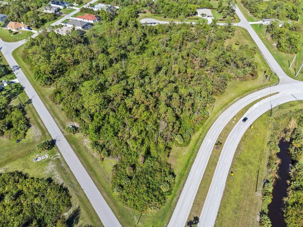 Photo of 102 Antilla Drive, Rotonda West, FL 33947 (MLS # TB8321676)