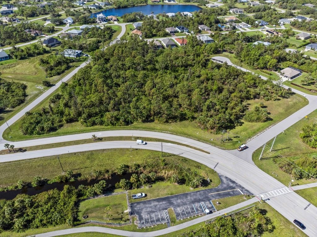 Photo of 102 Antilla Drive, Rotonda West, FL 33947 (MLS # TB8321676)