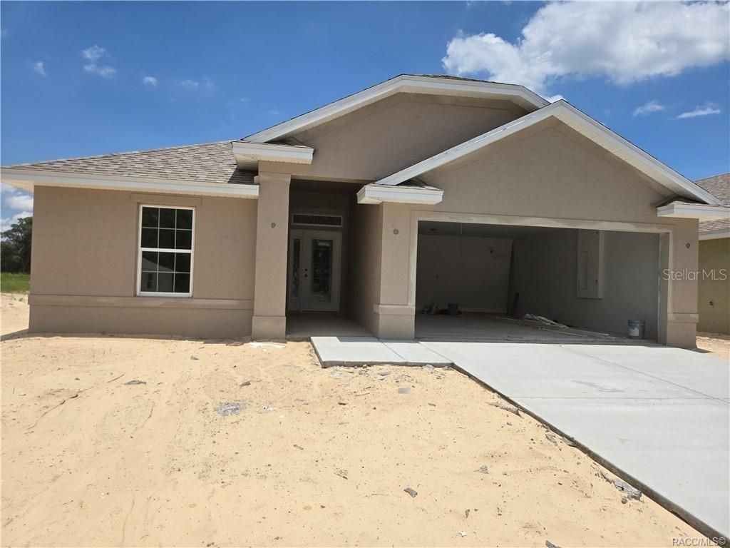 Photo of 1100 Heron Point Drive, Inverness, FL 34453 (MLS # OM711888)