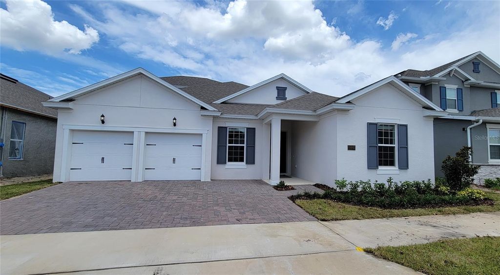 Photo of 15142 Lake Bessie Loop, Winter Garden, FL 34787 (MLS # O6396329)