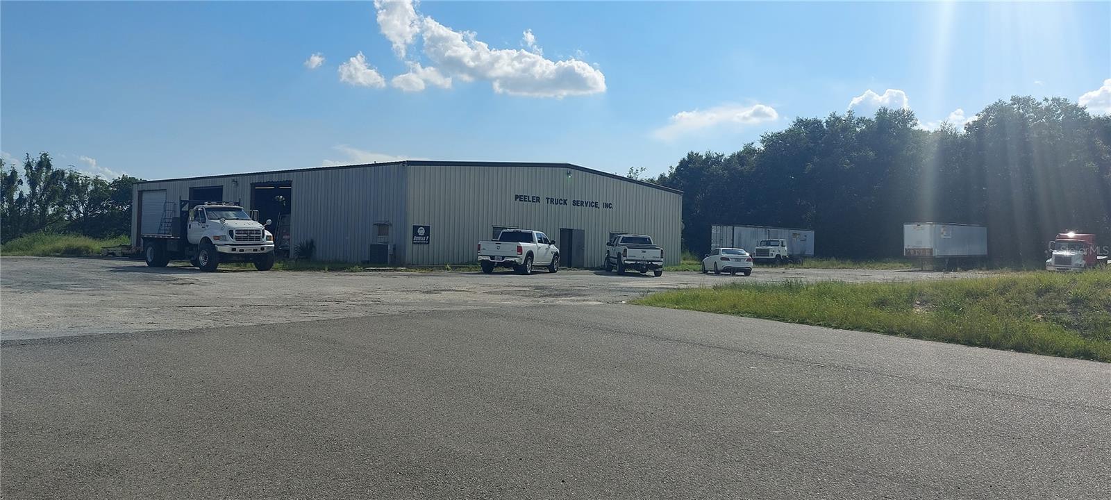 Outstanding Opportunity is knocking! Multiple approved future land uses for Re Development! Location, Location, Location! Approximately 350' of DIRECT State Rd 46 frontage, HIGH Visibility, easy access, circular drive around warehouse, high traffic count (2022 est 13,429.. and 2024 it was 24,000 and it keeps going up!)..This is a 10.94MOL acre parcel of land, inclusive of a 7500 square foot warehouse/shop building,(currently being used as a mechanic shop) Inclusive of 3 offices, 2 bathrooms, 1 shower, Large Storage area & elevated storage deck, then OPEN Warehouse with a total of six bay roll up doors ( 3 on each side) for easy access and/or drive thru access. The warehouse & parking are on approximately 1-2 acres therefore leaving 8-9 acres MOL, that remain undeveloped. Commercial, light manufacturing zoning, check out the Lake County zoning site to see the list of approved uses, development and possibilities for future uses. This property is located less than 1 mile from 453/429, the Orlando Beltway..and to the West, less than 2 miles to US 441! .Visit the Mount Dora City economic development site ( Wolf Branch Innovation District) to see what is coming! Specifically Check in to the
the joint planning area of City of Mount Dora and Lake County planned to become Lake County FLU - Regional Office & City of Mount Dora FLU Employment Center part of the Wolf Branch Innovation District Implementation Plan. This area is booming and will continue to do so with all of the New Communities, commerce and highway connectivity. The time is now to get your foot in the door...as the window of opportunity will be closing soon...Be a part of the State Road 46 corridor transformation. All information and measurements are deemed to be accurate, however, can not be guaranteed. Contact the Lake County zoning department with your specific questions. Take a closer look, you will be glad you didi! Some Examples of what Light Manufacturing Zoning Allows:
*Self Service Storage, Truckyard, Vehicular Sales, Wholesale/Warehouse, Industrial, Light, Bar or Tavern, Automotive Repair, Consumer Services & Repair, Electronic Game Room Facility, Recycling Center, Trucking Facilities, Cultural Institution, Primary or Secondary School, Public Safety Service, Utilities, limited, Utilities, Major, Parks & Recreation, Single Family Dwelling, General Agriculture, Kennels, Medical Services, Personal Care Services, Professional Offices, Recreation Commercial, Research Service, Restaurant, Fast Food & General, Retail Convenience