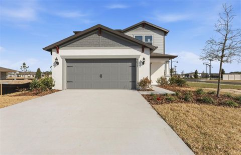 Photo of 9021 Wildlight Trail, Wildwood, FL 34785 (MLS # TB8436651)