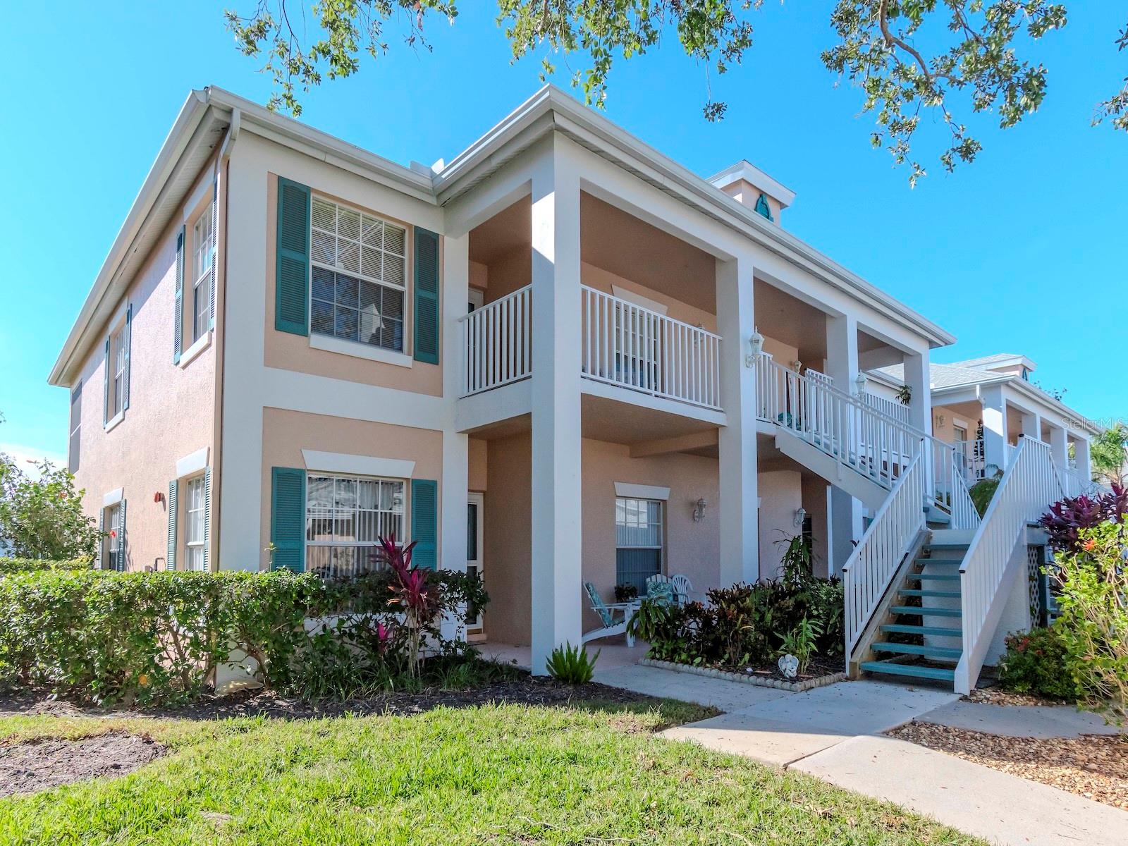 5.75 APR FINANCING AVAILABLE FROM OUR PREFERRED LENDER FOR QUALIFIED BUYERS! COMPLETELY RENOVATED IN 2024! This home offers a new kitchen with quartz counters and new cabinets. Both bathrooms have new walk-in showers and new vanities. Ceramic tile is used in the wet areas, and new luxury vinyl flooring is used in the living areas. Enjoy the lake view from your enclosed, covered balcony, and don't worry about maintenance; it's included in the fees the seller will pay through December 31, 2025! It is located in the Peridia Golf and Country Club and includes all the amenities except golf: community pools, clubhouse, restaurant, tennis, pickleball, a fitness center, and more. Golf memberships are available, too. Lots of restaurants and shopping nearby. Only 30 minutes to Bradenton Beach and barely 15 minutes to the UTC Mall.