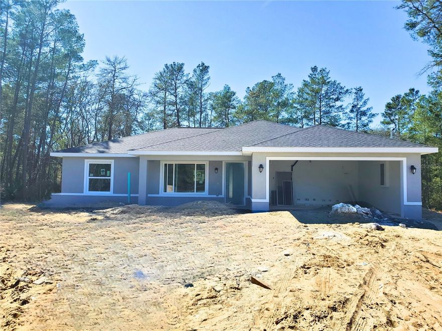 Under Construction. Your dream home awaits! Step into a space filled with comfort and style in this beautiful new construction home, designed with care and attention to every detail. It features custom soft-close wood cabinets, luxury vinyl flooring, elegant granite countertops, and refined tile work in both the shower and bathtub areas—offering the perfect combination of quality and modern design.
Enjoy the privacy of a split floor plan paired with an open-concept living area, ideal for both relaxing and entertaining. You’ll also appreciate the convenience of an indoor laundry room and a complete stainless steel kitchen appliance package.
Situated on just under 1/4 acre with a covered lanai for your year round enjoyment. Photos of finished model coming soon. Estimated completion Mid March.