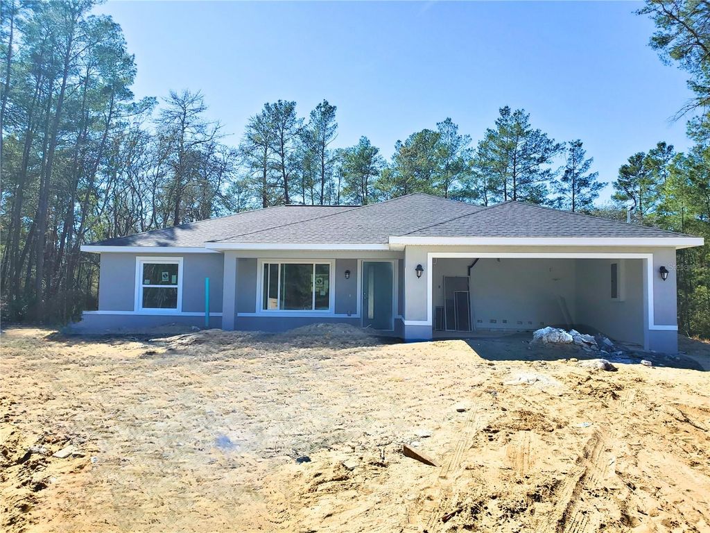 Photo of 14 Sequoia Trail Trak, Ocklawaha, FL 32179 (MLS # OM717717)