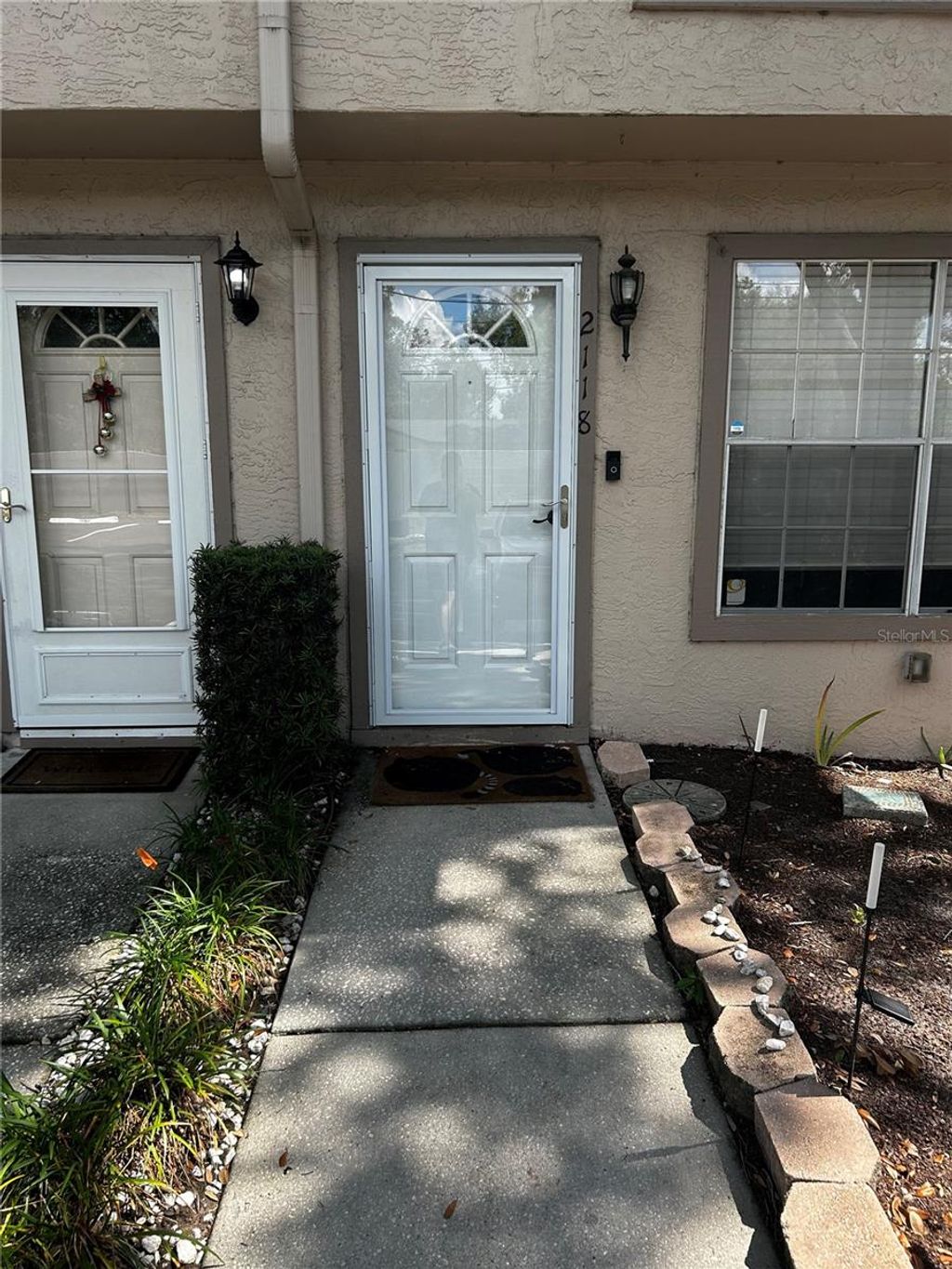 Photo of 2118 Fletchers Point Circle, Tampa, FL 33613 (MLS # TB8514294)