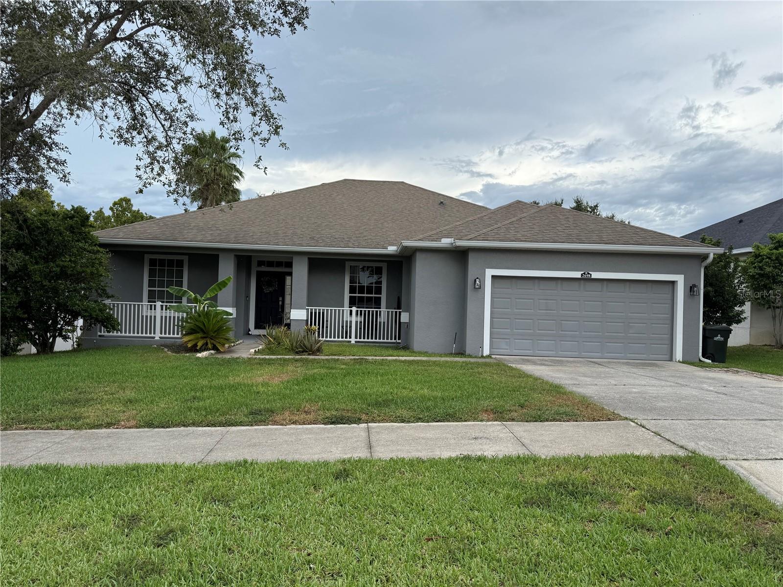 Welcome to this impressive 4-bedroom, 3-bathroom home at 2698 Eagle Lake Dr in Clermont's desirable Lost Lake Reserve neighborhood. With 4,209 square feet of living space, this property offers comfortable family living with room to grow.
The main floor features a spacious primary bedroom with tray ceilings, dual closets, and a well-appointed bathroom with double sinks, garden tub, and separate shower. The enclosed office with French doors provides flexible workspace options. The kitchen is designed for entertaining with a breakfast bar, dry bar, and built-in butler's pantry in the adjacent nook.
Entertainment options abound with a dedicated movie theater room that includes all equipment and furniture. The finished basement adds significant value with a huge flex space, kitchenette, additional bedroom, and full bathroom with dual sinks. This lower level offers endless possibilities for recreation or guest accommodation.
Step outside to enjoy the screened balcony and private, fenced backyard. The home needs some small renovations but is move-in ready for immediate occupancy.
Lost Lake Reserve provides excellent community amenities including a pool, two playgrounds, and a peaceful walking trail around the lake. Families will appreciate the convenient walking distance to East Ridge Middle School and East Ridge High School.
This property combines spacious living, entertainment features, and a prime location in one of Clermont's most sought-after neighborhoods. The flexible spaces and community amenities make this an ideal choice for families seeking comfort and convenience.