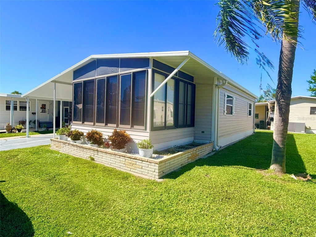 Photo of 2191 Ca D Oro Drive #38, Sarasota, FL 34238 (MLS # TB8552695)