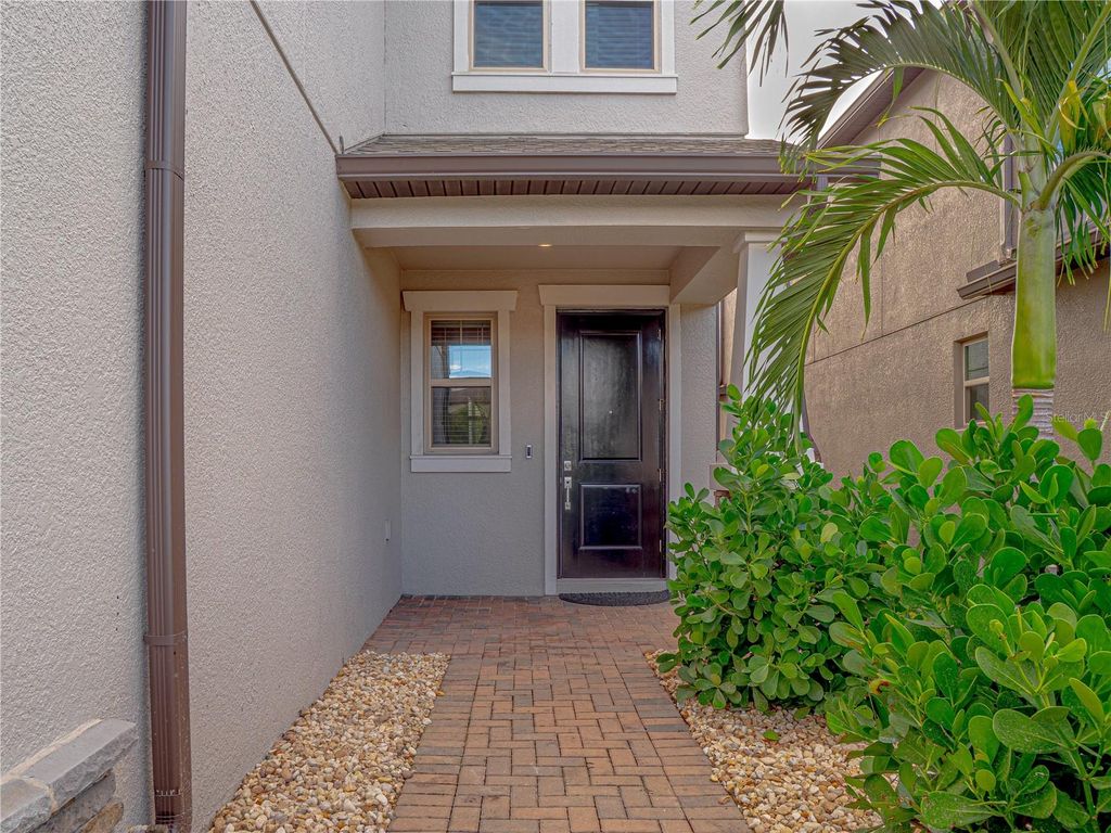 Photo of 9617 Wild Begonia Loop, Land O Lakes, FL 34637 (MLS # TB8433547)