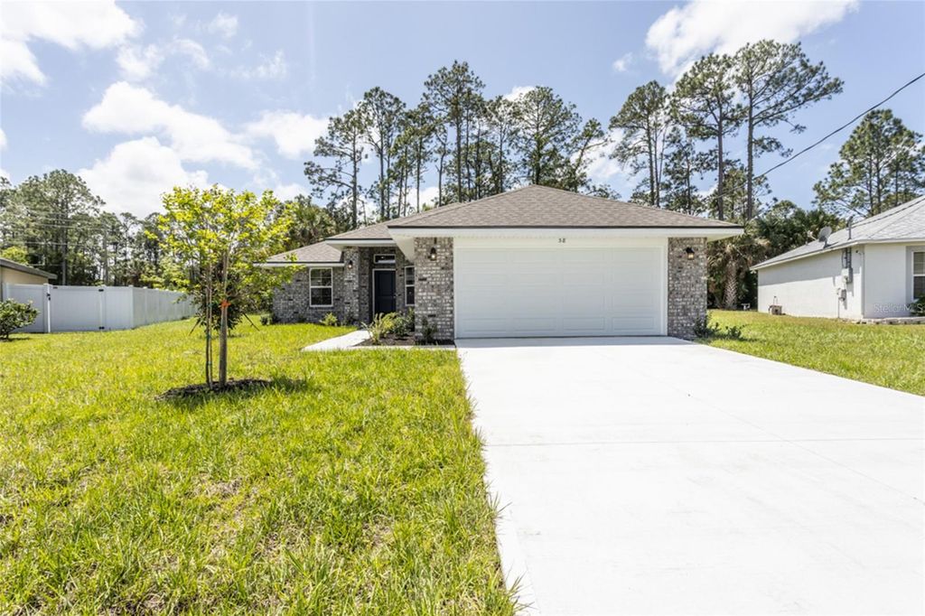 Photo of 79 Port Royal Drive, Palm Coast, FL 32164 (MLS # FC318038)