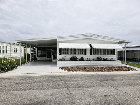 Photo of 3329 Oakwood Boulevard S, Sarasota, FL 34237 (MLS # A4696381)