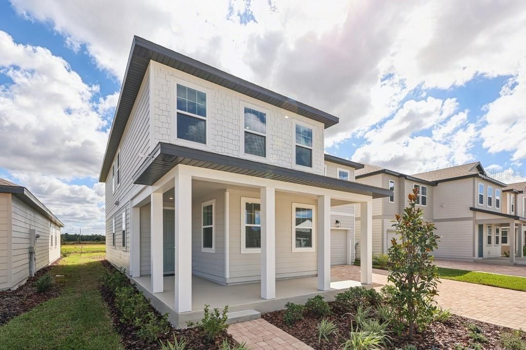 Photo of 30121 Misty Pines Rd, Mount Dora, FL 32757 (MLS # TB8442524)