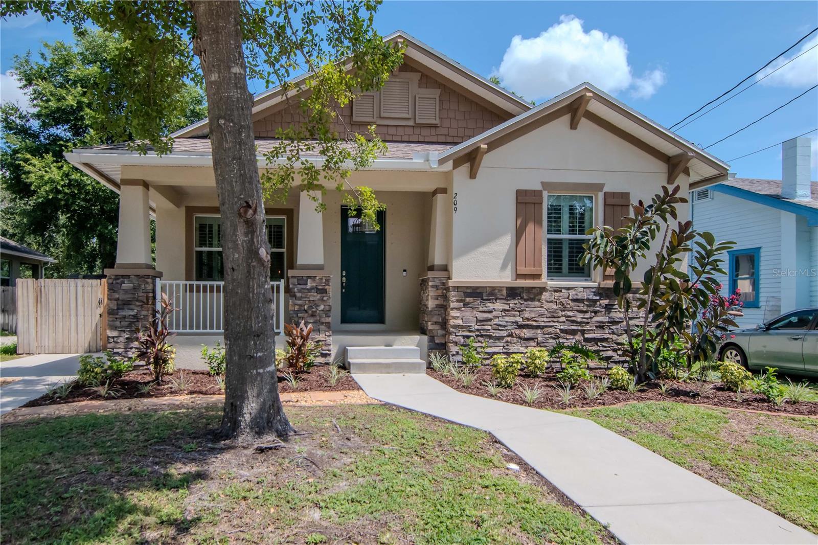 One or more photo(s) has been virtually staged. Welcome to this 2018 built block constructed home located in the heart of Seminole Heights. This charming residence offers modern comfort with timeless style, featuring designer lighting throughout and wood look ceramic tile in all main living areas. The split bedroom floor plan provides privacy, with cozy carpeted bedrooms and a spacious primary suite that includes a huge walk in closet, soaking tub, and separate shower stall. The kitchen boasts granite countertops, stainless steel appliances, and plantation shutters on every window add a touch of elegance throughout. Enjoy the convenience of an interior laundry room with washer and dryer included. Step outside to a fully fenced backyard with brick pavers, perfect for relaxing or entertaining, plus a shed for extra storage. A welcoming front porch adds curb appeal, and the location can’t be beat...just a short distance to Seminole Heights favorites like Bo’s Ice Cream, Rooster & the Till, The C House, The Front Porch, local breweries, coffee shops, and more. With easy access to ZooTampa, the Hillsborough River, I275, and Downtown Tampa, this home offers the best of urban living and neighborhood charm.