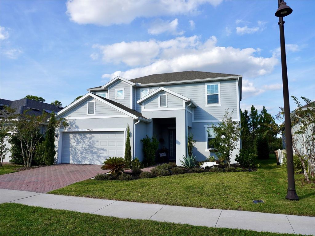 Photo of 17876 Passionflower Circle, Clermont, FL 34714 (MLS # O6355622)