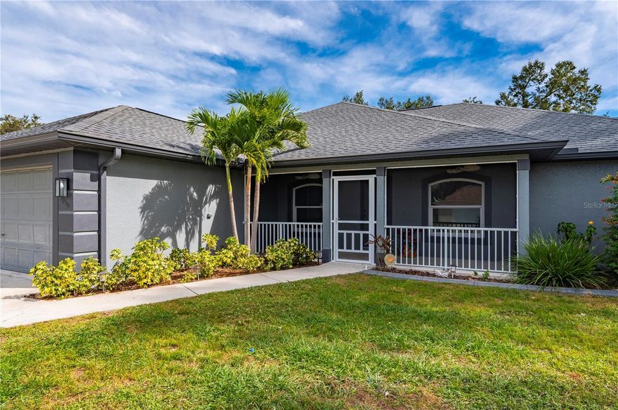 Soft views of surrounding trees create a tranquil backdrop for this inviting, move-in ready North Port 3-bedroom, 2-bath plus den home, showcasing over 2,000 square feet of thoughtfully updated living space including a 2023 remodel that blends modern comfort with timeless style. A spacious screened front porch welcomes you with a sense of ease, leading inside to two dens that can be used as a formal dining area on one side and a bright bonus room on the other - ideal as a home office, study, den, or creative space to suit your lifestyle. The great room opens with vaulted ceilings, recessed lighting, and gentle natural light, flowing seamlessly to a kitchen featuring stainless steel appliances, a breakfast bar, and a cozy dining nook. Neutral updated luxury vinyl flooring flows seamlessly throughout the entire home. The split layout enhances privacy with a generous primary suite complete with dual walk-in closets, and an updated bathroom which includes a walk-in shower with multi-colored lighting, dual vanities, and upgraded LED mirrors. Two additional bedrooms share an updated bath perfect for family and/or guests. The living space is extended onto a back screened lanai perfect for relaxed evenings and gatherings, overlooking a wide fenced yard and serene wooded views. Updates throughout the home include a recently added crushed-shell parking space for boat or RV parking, new roof installed in 2022, AC with blue light (2022), 175 mile per hour triple-pane impact windows (2023), a whole-house reverse osmosis system (2023), instant hot water system (2024), fresh exterior paint (2025), and an extra-large storage shed (2022). Located in North Port, this home combines peaceful surroundings with everyday convenience. You are just minutes from shopping, dining, parks, golf, and recreation, and a short drive brings you to award-winning beaches, the brand new Sunseeker Resort, and major sports venues including Tampa Bay Rays and Atlanta Braves ballparks. With easy access to Interstate 75, Sarasota, and Punta Gorda airports, North Port offers the perfect balance of relaxation and connection.