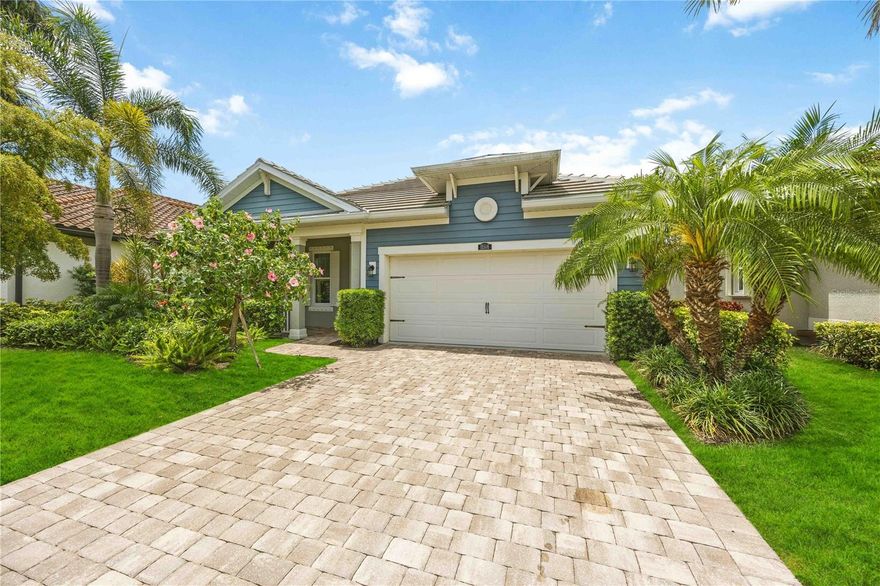 Welcome to one of the most desirable homesites in Renaissance at Wellen Park, offering unobstructed west-facing water views and unforgettable sunset backdrops. This beautifully maintained 3-bedroom, 2-bath residence with a flex room spans 1,936 sq ft and showcases a thoughtfully designed split floor plan that balances privacy with effortless flow.

From the moment you enter, natural light fills the living spaces, drawing your eye through to the expansive water views beyond. The heart of the home opens seamlessly to an extended covered lanai, creating the perfect setting for relaxing or entertaining while enjoying peaceful water vistas and vibrant evening skies.

The interior offers a clean, modern aesthetic with open-concept living and a versatile flex space ideal for a home office or den. A charming front porch enhances the home’s inviting curb appeal and provides a quiet place to start your day.

Positioned on a premium lot within a fully established, gated community, this home benefits from mature, established landscaping and a finished neighborhood setting with no ongoing construction—a rare advantage that adds both beauty and tranquility.

Renaissance at Wellen Park is an amenity-rich community featuring a resort-style pool, fitness center, tennis, pickleball, and a full calendar of social activities. Residents also enjoy direct access to a connected dog park, scenic walking paths, and a vibrant, active lifestyle—all with relatively low HOA fees.

Ideally located just minutes from Downtown Wellen, CoolToday Park, shopping, dining, and Gulf Coast beaches, this home delivers the best of Southwest Florida living.

A true opportunity to own a premium water-view property with exceptional sunset exposure in one of the area’s most sought-after communities.
