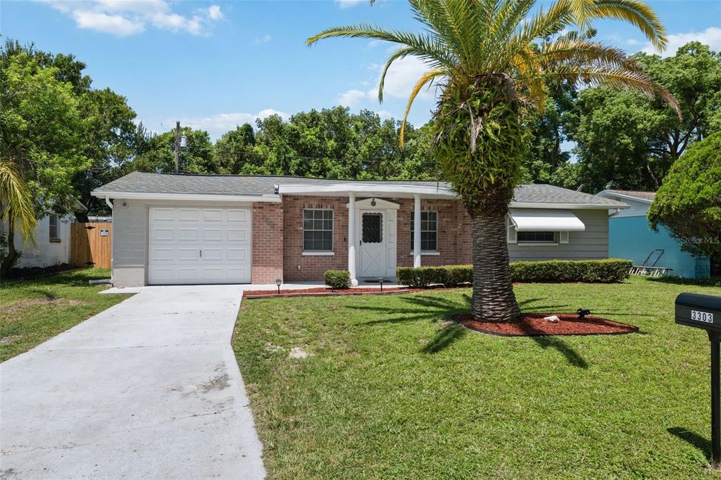 Photo of 3303 Williamsburg Loop, Holiday, FL 34691 (MLS # TB8415415)