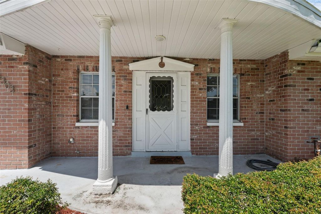 Photo of 3303 Williamsburg Loop, Holiday, FL 34691 (MLS # TB8415415)