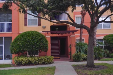Photo of 6335 Contessa Drive #205, Orlando, FL 32829 (MLS # O6345202)