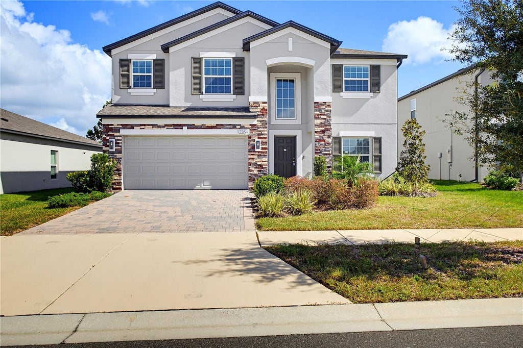 Photo of 12264 Hilltop Farms Drive, Dade City, FL 33525 (MLS # O6452591)