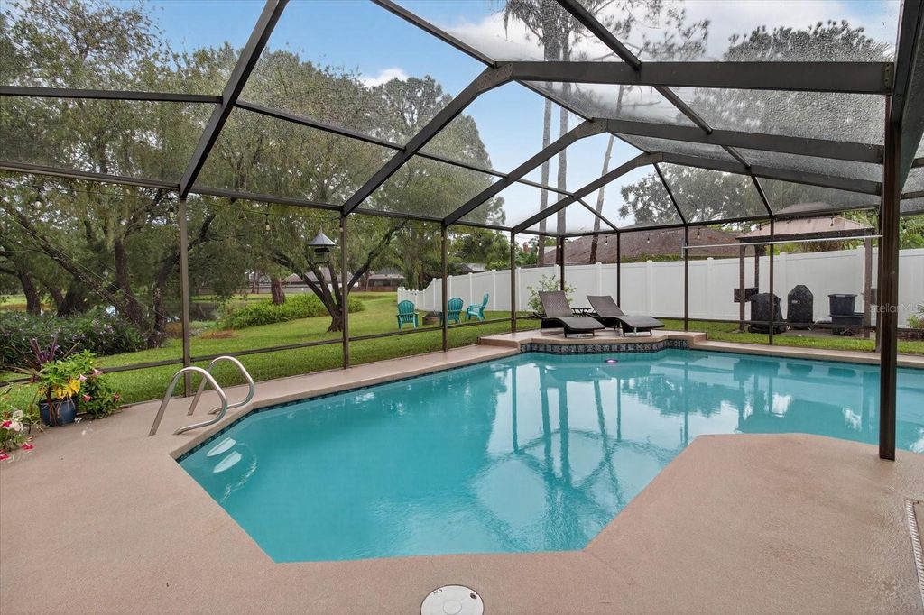 Photo of 9416 Pebble Glen Avenue, Tampa, FL 33647 (MLS # TB8431374)