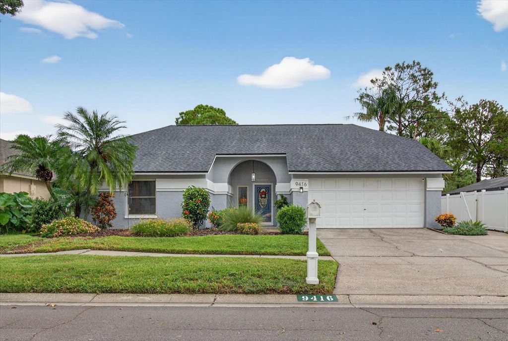Photo of 9416 Pebble Glen Avenue, Tampa, FL 33647 (MLS # TB8431374)