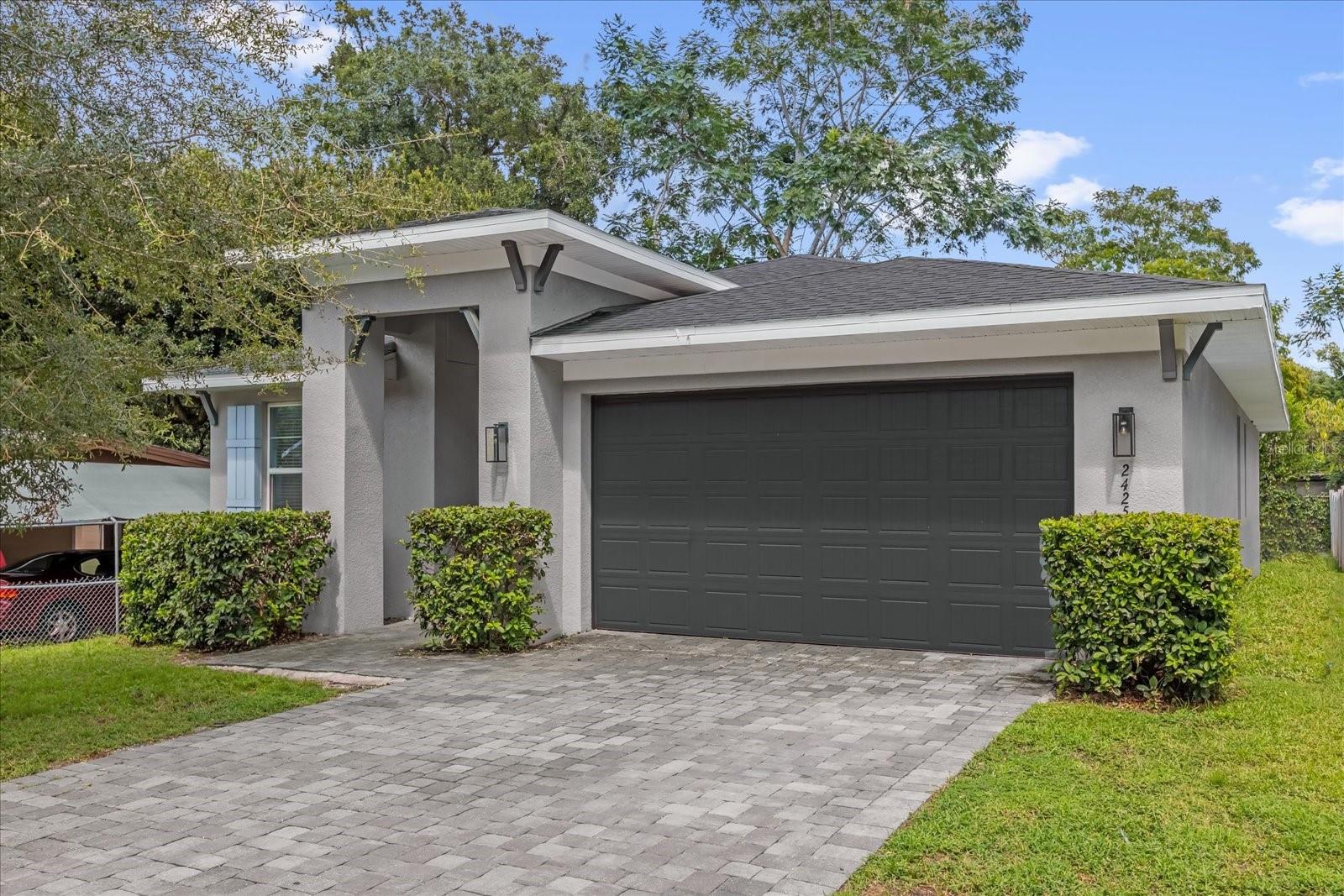 Welcome to this beautifully designed 4-bedroom, 2-bathroom home at 2425 Newberry St in Orlando! This 1,938 square foot house features an open floor plan that creates a spacious feel throughout. You'll love the hard flooring in the main living areas, while the bedrooms offer comfortable carpeting.
The kitchen is a real highlight with its island, quartz countertops, stainless steel appliances, and 42-inch cabinets. There's even a walk-in pantry for extra storage. The high ceilings and modern design give the home a fresh, contemporary look.
The primary bedroom is truly expansive and includes an ensuite bathroom with a glass-enclosed shower and a massive walk-in closet. All bedrooms are well-sized and perfect for family living.
Outside, you'll find a fenced yard and a paver driveway. One of the best parts? No HOA fees! The location is prime - you're in a quiet neighborhood but close to everything. The home is zoned for excellent schools including Lake Como K-8 and Boone High.
You're just a short walk from the trendy Hourglass District with its creative energy. Plus, you're minutes away from downtown Orlando entertainment, shopping, the Conway Chain of Lakes, Amway Center, Dr. Phillips Performing Arts Center, Lake Eola, and Orlando City Soccer Stadium.
This SODO/Lake Como area location gives you the perfect blend of peaceful neighborhood living with easy access to all Orlando has to offer. Don't miss this opportunity to own in such a desirable area!