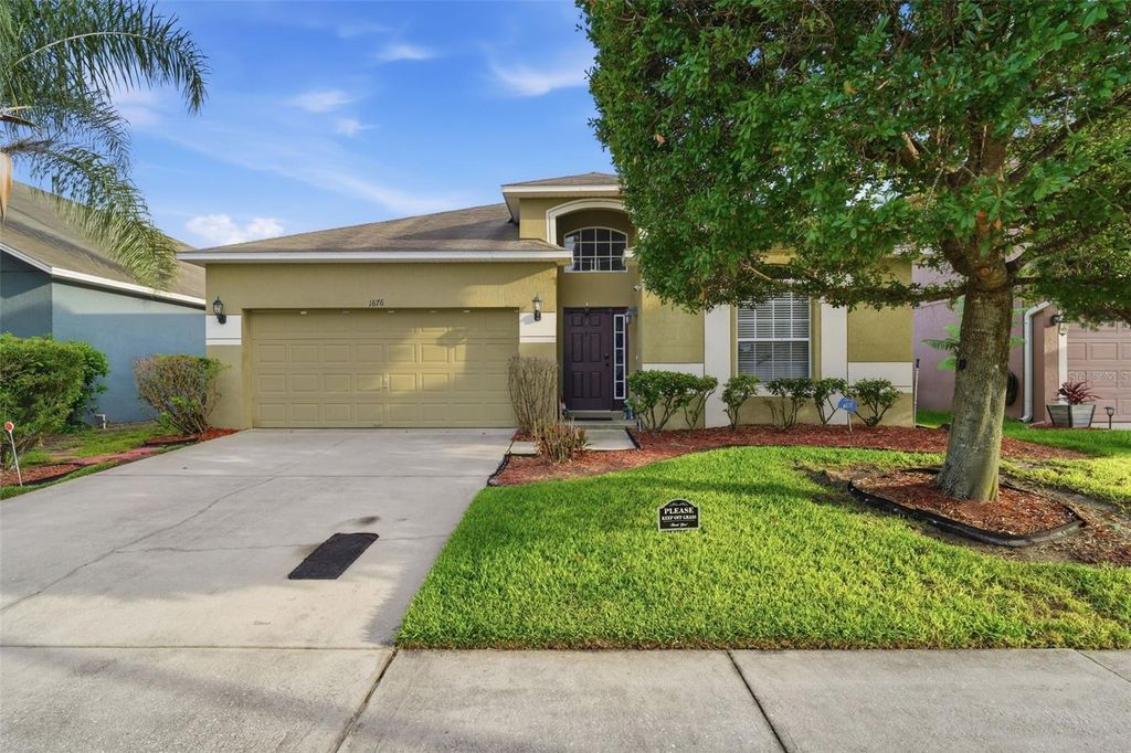 Photo of 1676 Canoe Creek Falls Drive, Orlando, FL 32824 (MLS # O6407938)