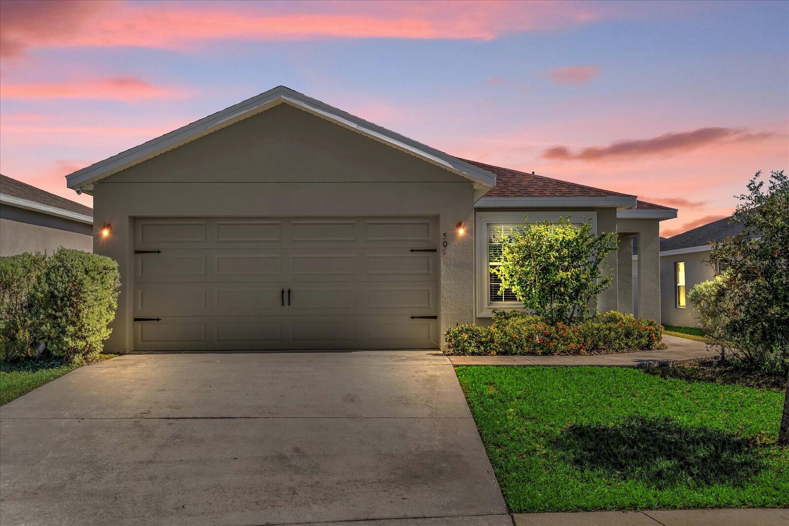 One or more photo(s) has been virtually staged. Welcome to this well-maintained 3-bedroom, 2-bathroom home in the desirable Highland Meadows community. Built in 2019, this single-story concrete block home offers 1,342 sq ft of living space with vaulted ceilings and tile flooring throughout. The open-concept layout features a kitchen with stainless steel appliances, wood cabinetry, a pantry, and stone-look counters with a raised breakfast bar flowing into the dining and living areas. The primary suite includes a walk-in closet and en-suite bath with a step-in shower.
Enjoy outdoor living in the partially fenced backyard with a concrete patio. Additional highlights include fresh interior paint, an interior laundry room with washer and dryer, and a two-car garage with utility sink and attic access. Community amenities include a resort-style pool, playground, and dog park. Conveniently located near, US 27 Hwy, 17-92 rd, shopping center, restaurants, schools, medical facilities, Coming soon Polk State College and just 30 minutes from Disney.
Schedule your private showing today!