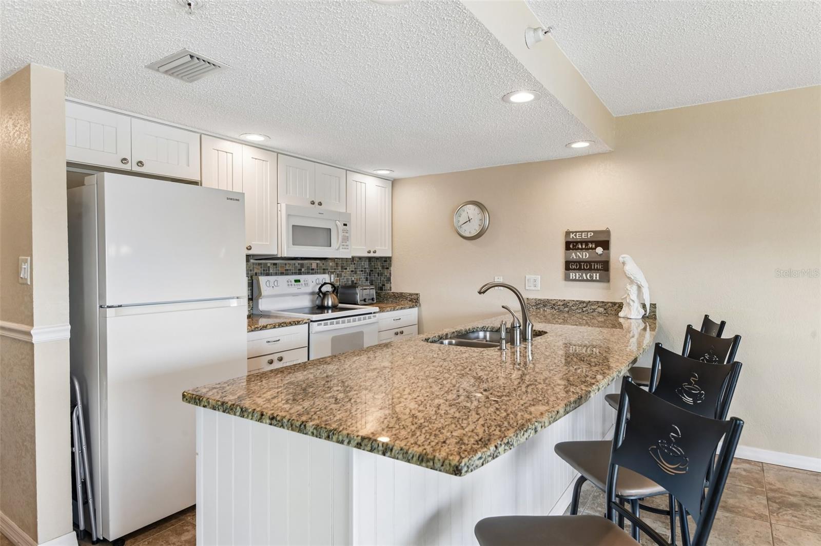 FIFTY GULFSIDE CONDO - Residential