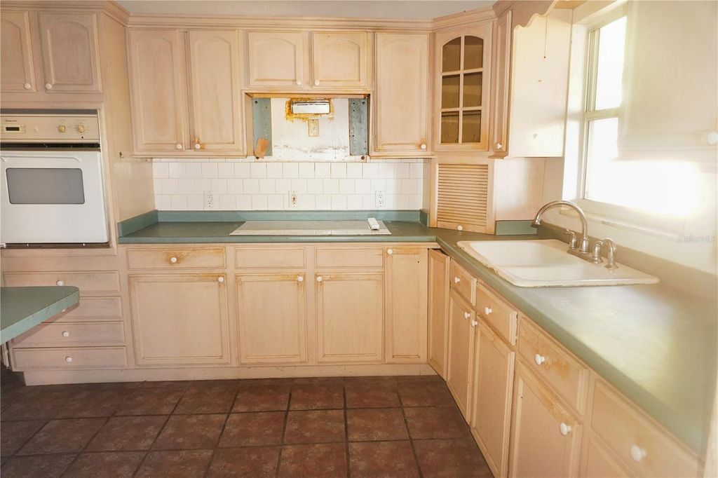 Photo of 385 Dolphin Avenue SE, St Petersburg, FL 33705 (MLS # TB8467232)