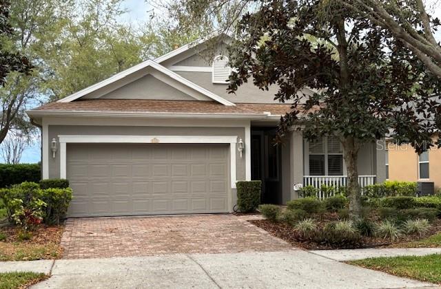 POSSIBLE OWNER FINANCING. Called Trilogy Orlando, but really on Hwy 27 N of Hwy 50, a 55+ community. This beautiful single family home features a screened Lanai, a private backyard with a wall behind it and no rear neighbors. As you approach the house see the paver brick driveway and sidewalk and front porch. Foyer leads to kitchen/has 36” wood cabinets, stainless steel appliances, tile floor, eating space in the kitchen, gas stove, and open to the living room/dining great room, with a beautiful wood floor. Plantation shutters throughout the house. The primary bedroom has a huge walk-in closet, carpeted and vaulted ceiling. The primary bath features dual sinks, and a spacious walk-in tiled shower with a built-in seat. The 2nd bedroom is carpeted and could also be a nice office. 2nd bath has a tub & shower & is private for guests. The designer kitchen includes hard surface counters, gas range, stainless steel appliances and a closet pantry. There is a convenient eating space off the kitchen with lots of bright light. Living/dining room combo next to kitchen has sliding patio doors to the lanai with a paver floor. Great spot for a tranquil morning cup of coffee and evening beverage. Interior laundry includes Washer & gas Dryer and extra cabinets. 2 car attached garage with garage door opener. HOA includes, 24 hour manned security gate, cable & internet, indoor/outdoor pools, fitness center, tennis courts, pickle ball, arts and craft room, card rooms, bocce ball, walking trails, there is a demonstration kitchen, ballroom, dance studio, poker lounge, a golf simulator, billiard room, a long list of exercise classes, concerts, shows and much more, plus yard maintenance. Where your neighbors become your family, and you can meet every day at the Magnolia restaurant for Happy Hour. Owner is a FL licensed Realtor and has never lived in the house. Seller does not want to close until June 1, 2025. Ask about it. The W/D that will convey with the house is in the pictures, it may not be in the home when you see it.