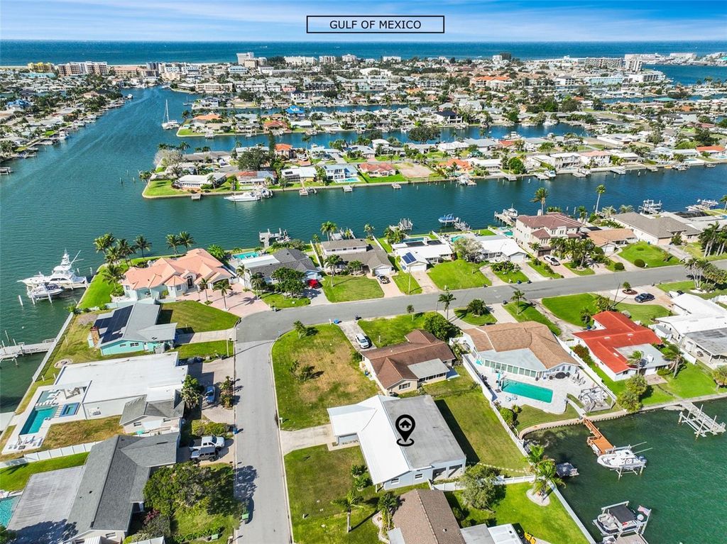 Photo of 710 116th Avenue, Treasure Island, FL 33706 (MLS # TB8431006)