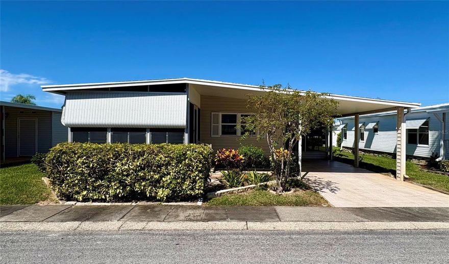 Wonderful fixer upper oozing with potential! This two bedroom/two bath double wide manufactured home is situated in Blue Jay Estates, an active 55+ community where you own your land. A low monthly fee of $230 a month includes escrow reserves, water, sewer, trash, lawn care, and more! Non flood zone! Eat in kitchen with sky light and room for a side bar or office. Dining room with large built in buffet. Laminate floors and overhead duct work so no floor registers. Square footage is 1152 which does not include an enclosed front porch or screened side porch. Plenty of storage in roomy shed with utility sink. Nicely Landscaped. Needs a little TLC to transform into your forever home. Blue Jay Estates is a well-maintained community that has a very active social club, lots of activities, a heated pool for year-round enjoyment, shuffleboard and Bocce courts. There is a designated area where you can park your boat or R/V at no additional fee if space is available when requested. Near beaches, the Pinellas trail, parks, shopping, medical centers, and airports.