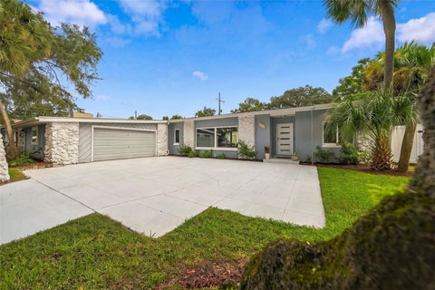 Photo of 1221 Silverstone Avenue, Orlando, FL 32806 (MLS # O6449567)