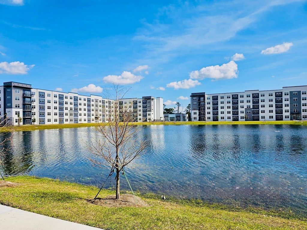 Photo of 5579 Millenia Park Boulevard #205, Orlando, FL 32839 (MLS # O6391732)