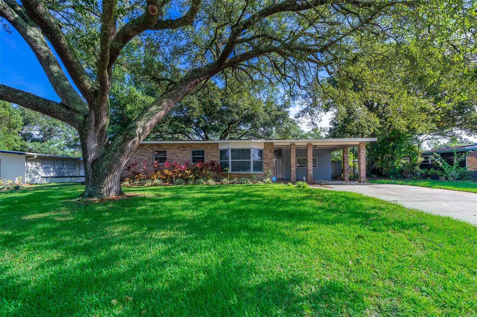 This stunning three-bedroom, two-bathroom gem is everything you've been searching for. The seamless flow between the kitchen, family room, and large dining space is perfect for entertaining guests. The kitchen is a culinary enthusiast's delight, featuring modern appliances, ample cabinet space, and a convenient layout. This home also offers a separate laundry room and storage room, making organization a breeze. In addition to its charming interior, this property has a beautiful backyard and requires low maintenance! NEW ROOF will be installed in June 2023. Located in Sanford, minutes from Lake Mary Blvd, you'll have access to a variety of amenities, including parks, shopping centers, dining options, Historic Downtown Sanford and more. With its prime location, this home offers the perfect balance of tranquility and convenience.