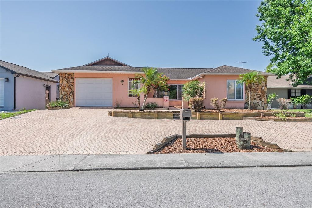 Photo of 7812 Turnbridge Drive, Port Richey, FL 34668 (MLS # TB8378071)