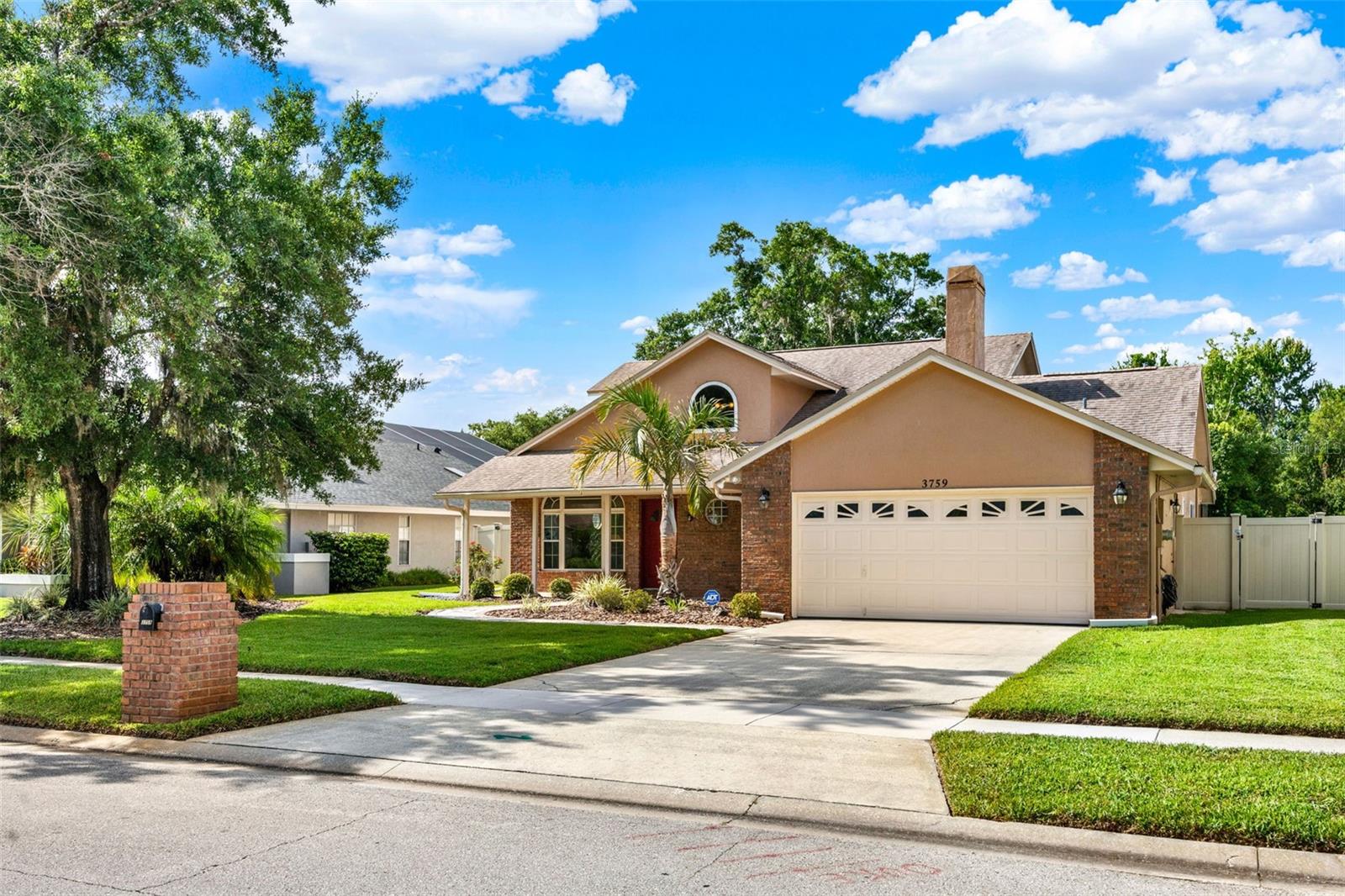 EXPECT TO BE IMPRESSED! Tucked away in a quaint and quiet Winter Park neighborhood, this beautifully maintained two-story 4-bedroom, 2.5-bath pool home sits on a lushly landscaped conservation lot with a charming paver walkway and inviting curb appeal. From the moment you step inside, you’ll appreciate the thoughtful updates and timeless character that make this home truly special.The newly renovated kitchen is a showstopper—featuring granite countertops, modern cabinetry, stylish backsplash, and recessed lighting—perfectly positioned to overlook the serene screened-in patio and saltwater pool, complete with a solar heating system for year-round enjoyment. The formal living and dining rooms offer volume ceilings, while the stunning two-story family room is anchored by a cozy wood-burning fireplace and custom built-ins, creating an ideal space for both entertaining and everyday living. The first-floor primary suite offers a peaceful retreat with an updated en-suite bathroom featuring granite counters, a clawfoot soaking tub, separate shower, and a spacious walk-in closet with California closet systems. Upstairs, you’ll find three generously sized bedrooms, an updated full bath, and a loft area—ideal for a home office, playroom, or second living space. Additional highlights include newer asphalt shingle roof (2020), a new HVAC system installed in 2023, and a vinyl privacy fence (2015) enclosing the St. Augustine-grassed backyard. The garage is fully functional with two remotes, and the home features a 13 x 5 inside laundry room, security system, and attic space above the garage. Flooring includes ceramic tile in most downstairs spaces, wood laminate in the living room, hardwood in the upstairs office, and carpet in two upper bedrooms (potentially over hardwood). The saltwater pool is owner-maintained, the setting—backing to conservation—makes it a private oasis. The home is connected to municipal sewer, has a termite protection plan, and is free of known structural or inspection concerns. The HOA fee is only $450 per year, covering common area maintenance, street lighting, and a festive neighborhood holiday celebration. Between the exceptional layout, upgrades, peaceful setting, and unbeatable location, 3759 Kinsley Place offers the perfect blend of style, space, and tranquility. Zoned for “A” rated schools and minutes from Trinity Prep, 417, UCF, shopping, and restaurants. WELCOME HOME!