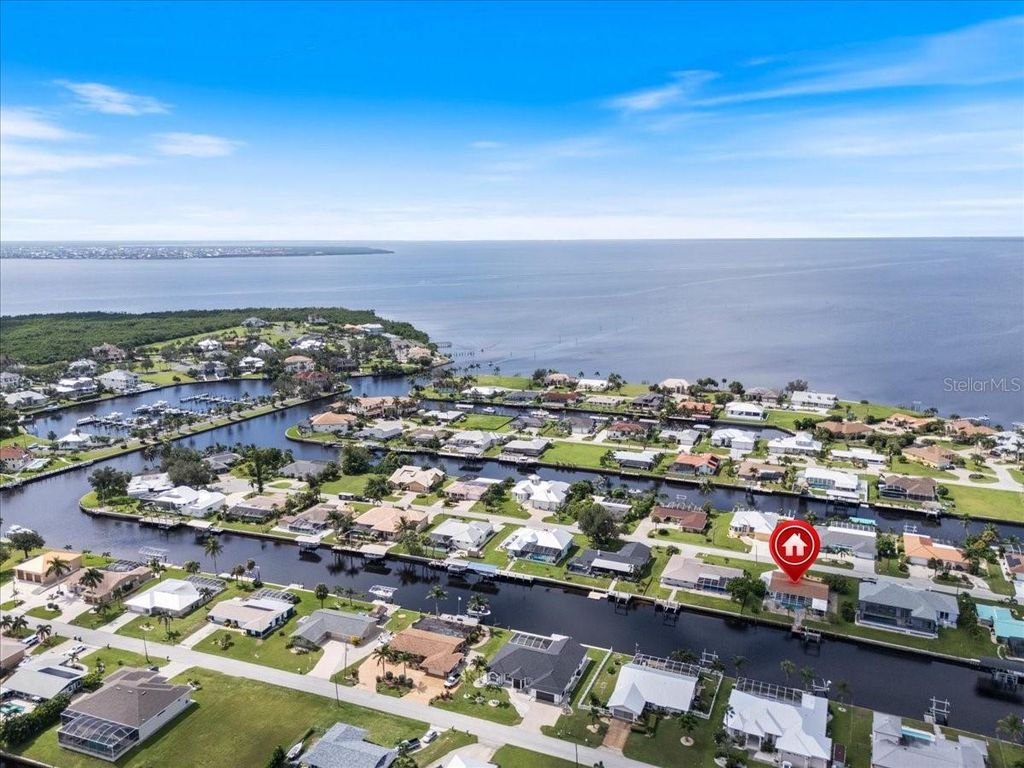 Photo of 124 Sinclair Street SE, Port Charlotte, FL 33952 (MLS # C7514529)