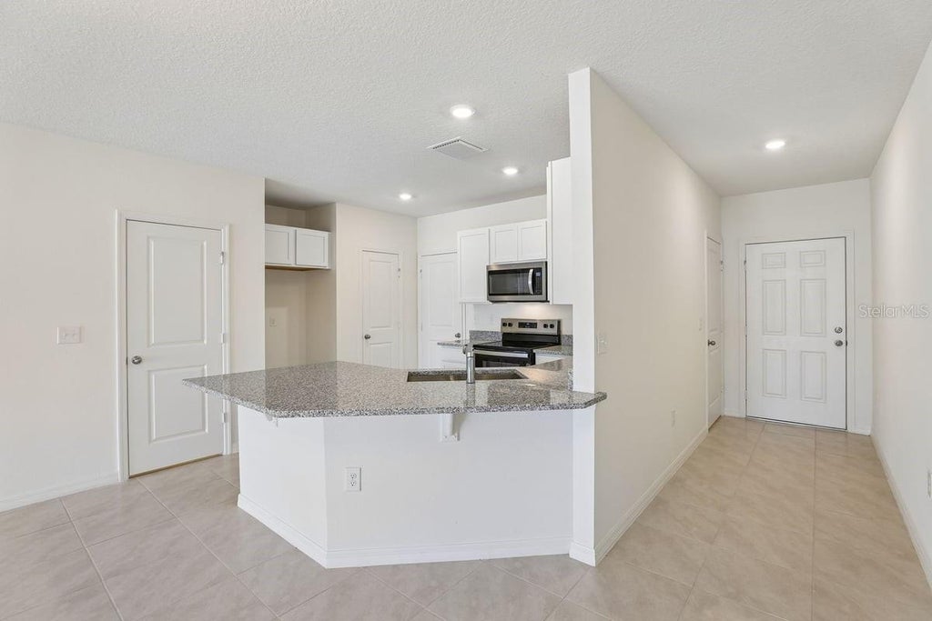 Photo of 524 Pine Ridge Court, Lake Wales, FL 33859 (MLS # O6443283)
