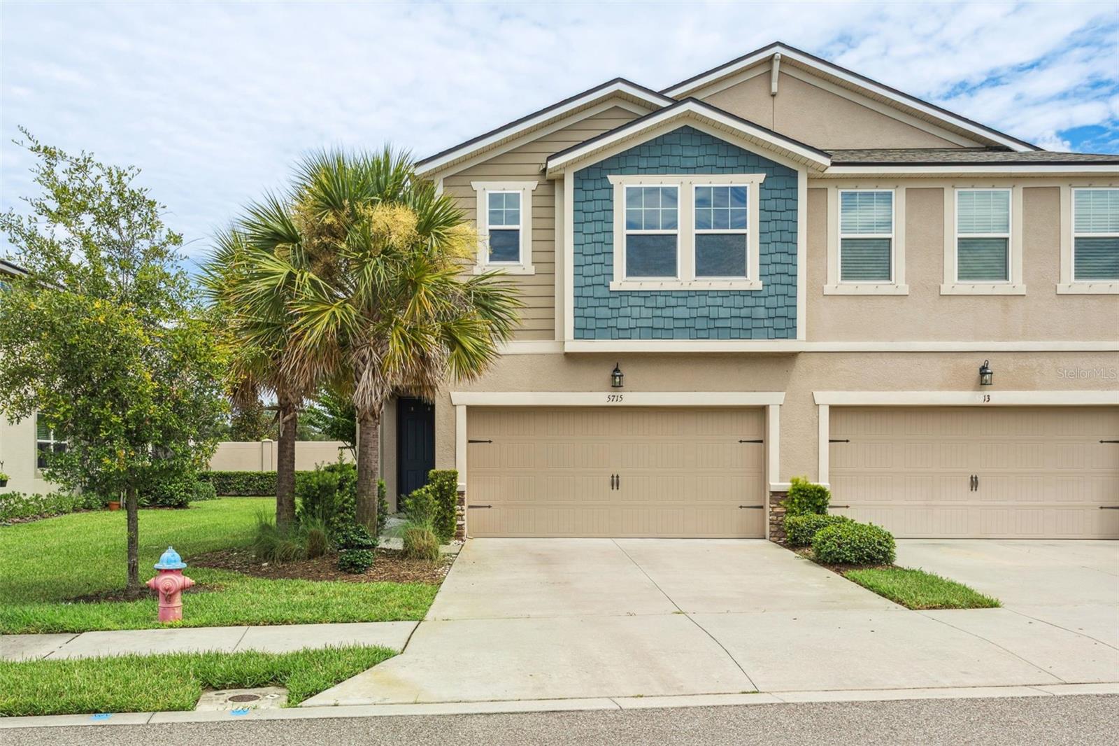 Don't be late to see this Avea Point townhome! Just in time for the new school year in the highly desirable Steinbrenner district. Enjoy the benefits of a newer construction townhouse with multiple upgrades and tranquil living. As you enter the home, the kitchen/living room open concept welcomes you in with upgraded cabinetry (with lighting), beautiful quartz countertops, sleek stainless steel appliances, a spacious pantry, and an extra large island that finds itself at the center of all conversations. The open living area is perfect to enjoy company, and large sliding glass doors lead out to your screened in patio. The home has high ceilings throughout, lending itself to making the space feel larger than it already is. With a guest suite downstairs it offers a first floor bedroom which is hard to find. The upstairs area of the property features all 3 large bedrooms plus a spacious loft. The primary bedroom itself has an oversized closet area with inviting primary bathropom. Laundry is located on the second floor, perfect for washing/drying the loads straight from the bedrooms. The two other bedrooms and bath are perfect for multiple residents or office use. The townhome itself features extra spaces of storage, with a large under-stair area as well as overhead shelves in the garage. The community of Avea is a private/gated collection of beautiful newer construction townhouses that enjoy a sparkling community pool.