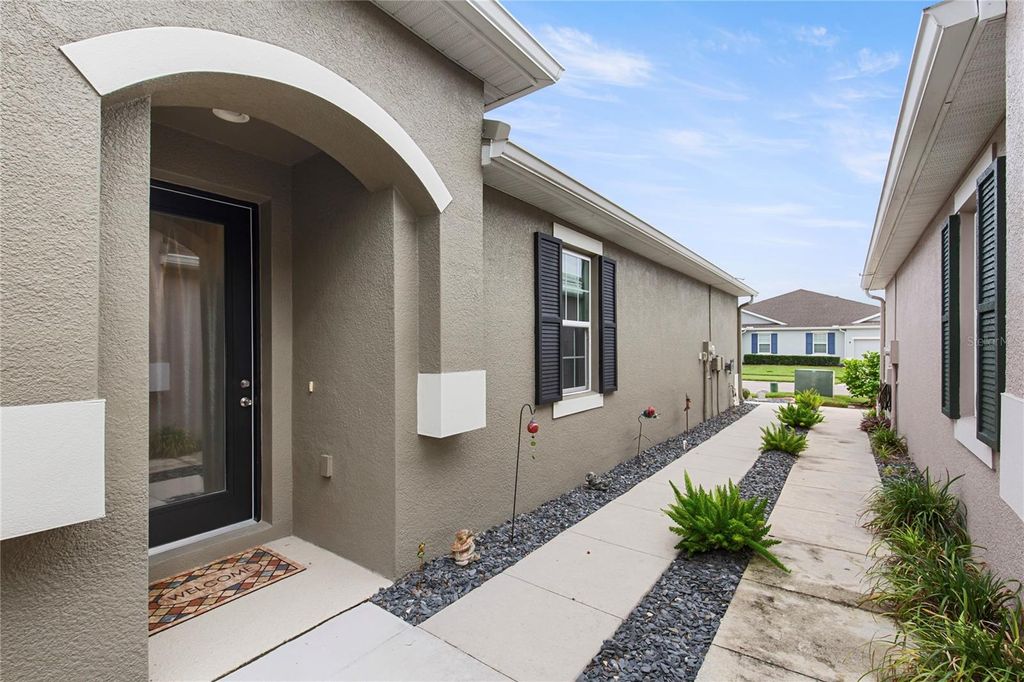 Photo of 10417 Heron Hideaway Loop, Land O Lakes, FL 34638 (MLS # TB8426410)