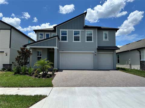 Photo of 10156 Eagelcreek Loop, Land O Lakes, FL 34638 (MLS # J1003673)