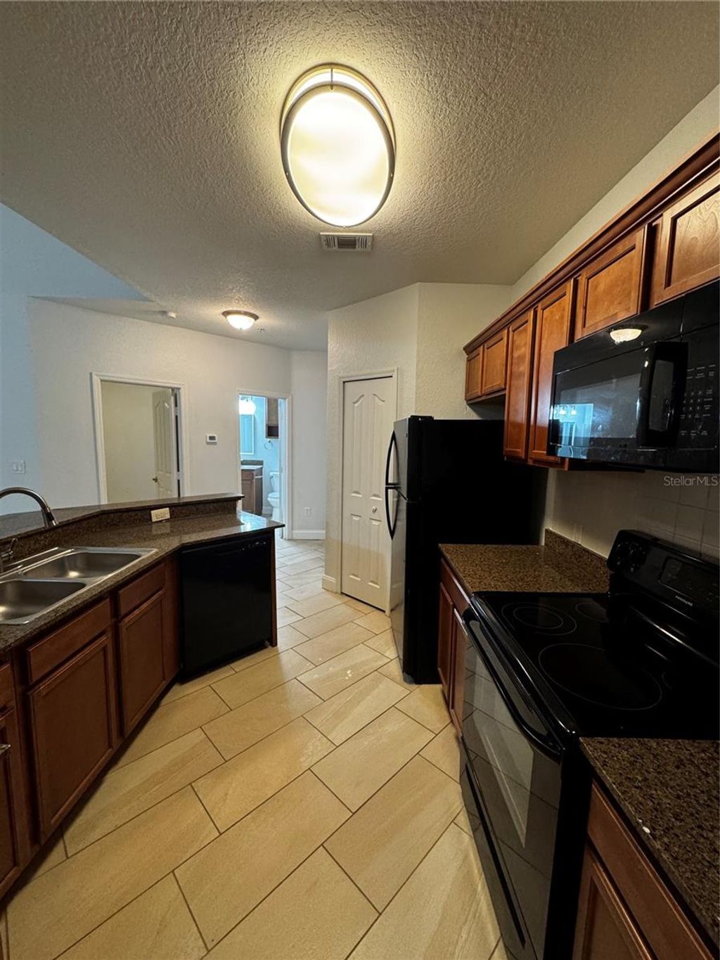 Photo of 5609 Legacy Crescent Place #301, Riverview, FL 33578 (MLS # V4946488)