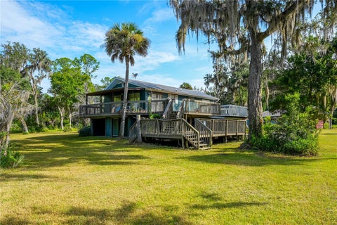 Photo of 1879 Hideaway Lane, Edgewater, FL 32132 (MLS # O6436933)
