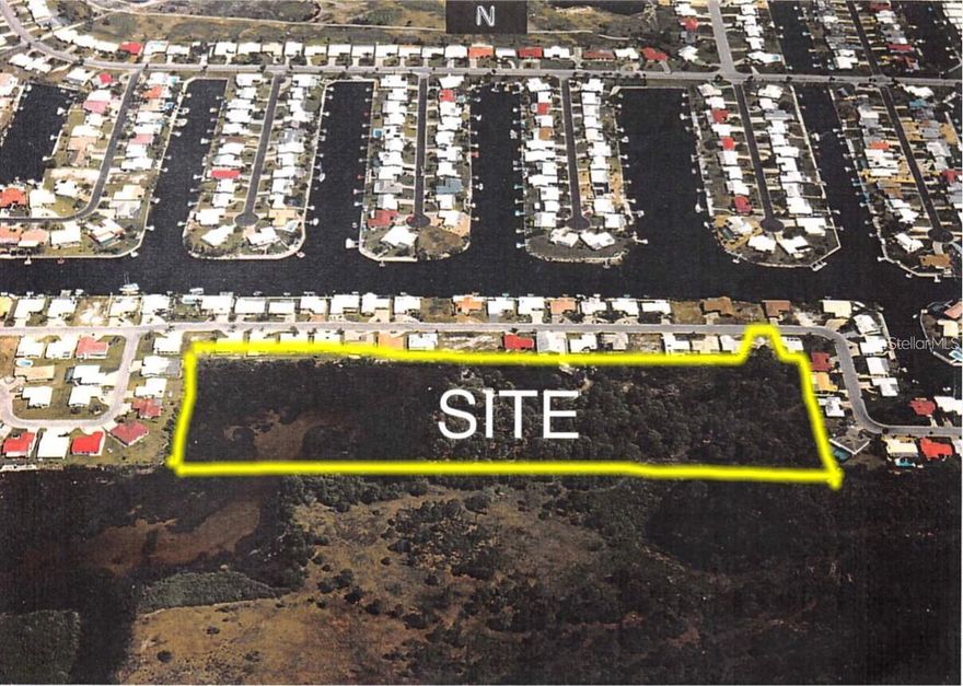 Incredible and rare opportunity to own over 10 acres in the highly sought-after waterfront community of Gulf Harbors in New Port Richey, FL. This unique offering includes two adjoining parcels being sold together—one inside Gulf Harbors and the other directly adjoining to the west. The first parcel is a 0.15-acre lot zoned R4 within the Gulf Harbors community, granting full access to the private amenities, including waterfront parks, community boat ramps, and optional membership to the exclusive Gulf Harbors Private Beach. The second parcel is a 10-acre tract zoned agricultural, featuring approximately 3.5 acres of high and dry buildable land. Currently, zoning allows for up to 3 homes to be built, each with scenic views and privacy. The property’s future land use is designated for high-density residential—up to 12 units per acre—making it an ideal site for residential development. Rezone and transform this land into a stunning new subdivision with single-family or multi-family homes, or build a private estate and enjoy space to raise livestock, grow gardens, or live off the land. The property backs up to a tranquil estuary, offering direct water access for shallow draft boats, kayaks, paddleboards, and jet skis. From your backyard, you can be out on the Gulf of Mexico within 10 to 15 minutes. The nearby Anclote Key Preserve State Park and islands are just 5 miles offshore, offering some of the most pristine beaches in Florida. Whether you're an investor, developer, or buyer looking to build your dream compound, this property has it all—access, acreage, zoning potential, and the best of Florida’s coastal lifestyle. The property is gated and private tours are available by appointment only. Access is through 4218 Rudder Way, New Port Richey. Don’t miss this once-in-a-lifetime opportunity to own a piece of Florida’s natural beauty with endless potential. Live, develop, or invest in the future of waterfront living.